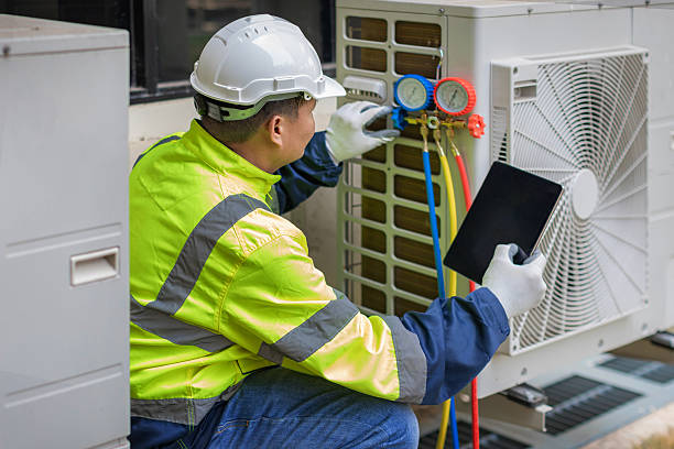 Professional Hvac technician working in Madison, IL